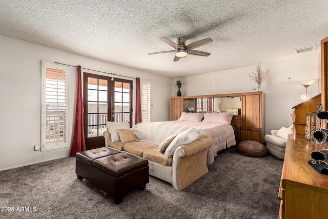 carpeted bedroom featuring access to exterior, french doors, a textured ceiling, and ceiling fan