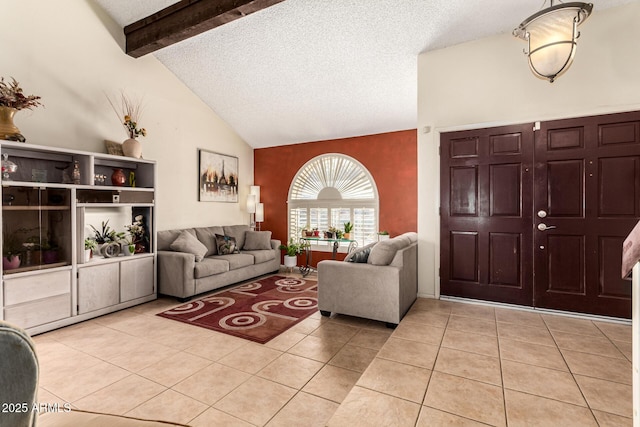 tiled living room featuring a textured ceiling, high vaulted ceiling, and beamed ceiling