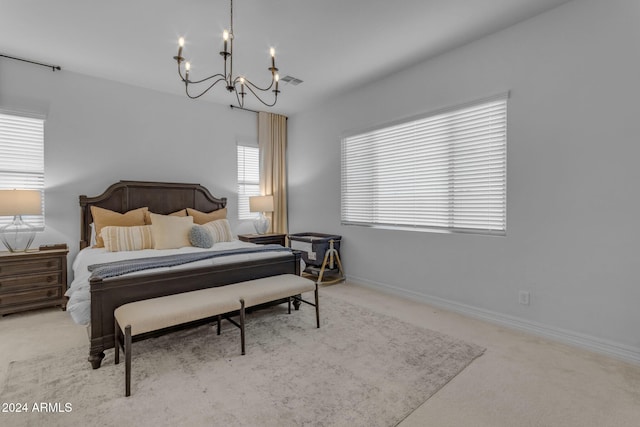 bedroom featuring visible vents, baseboards, carpet floors, and a chandelier