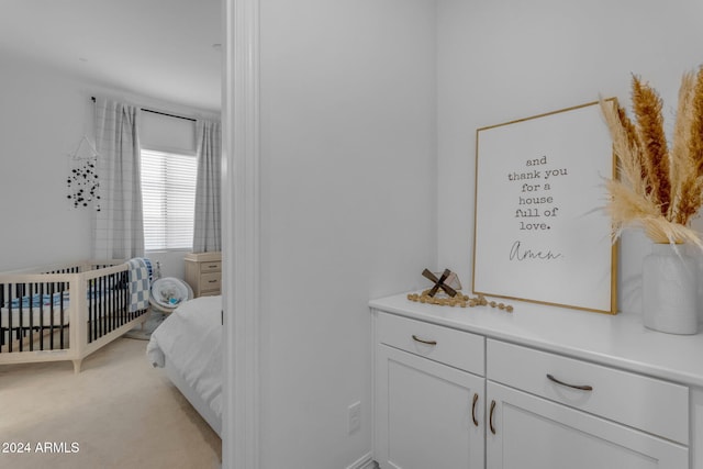 bedroom with light carpet