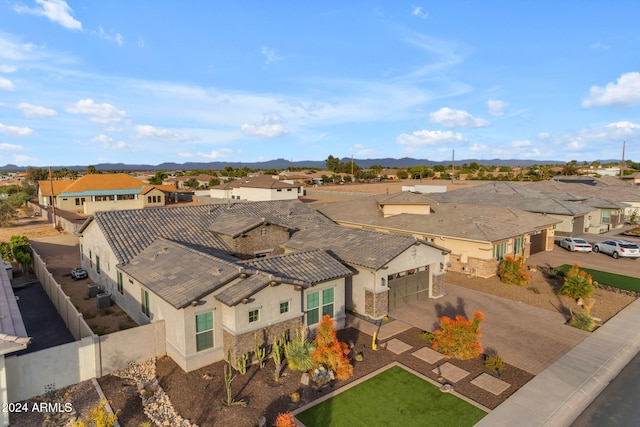 birds eye view of property with a residential view