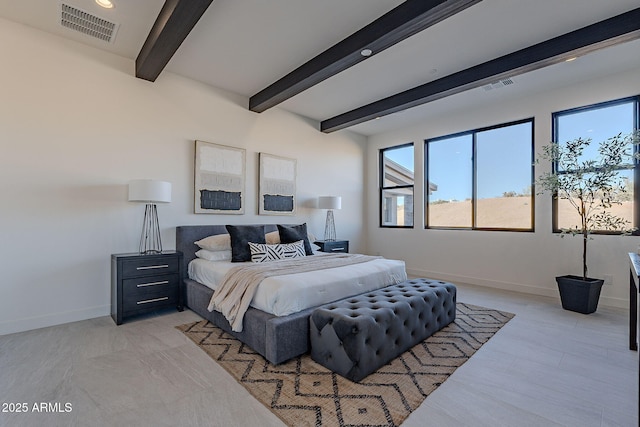 bedroom with beam ceiling