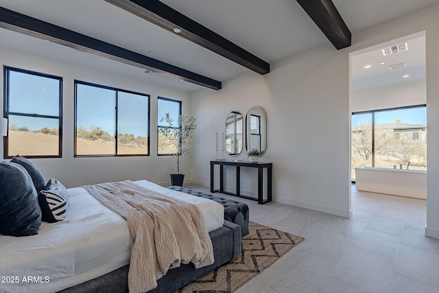 bedroom with beam ceiling