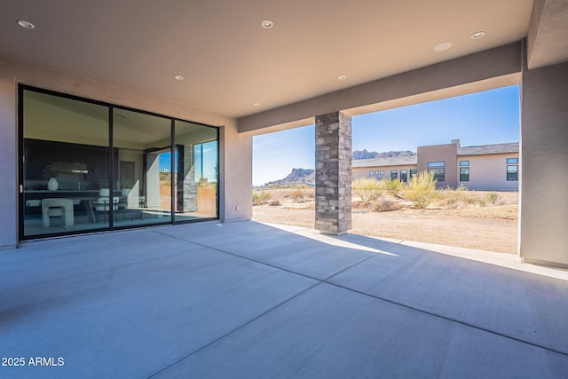 view of patio featuring a mountain view