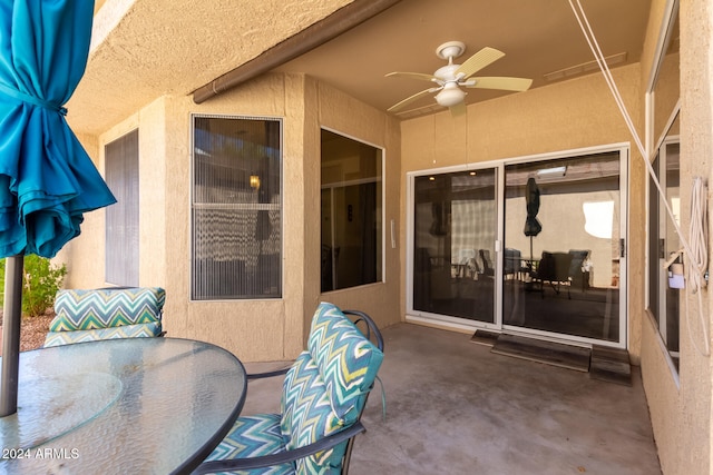 view of patio / terrace featuring ceiling fan