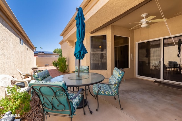 view of patio with ceiling fan