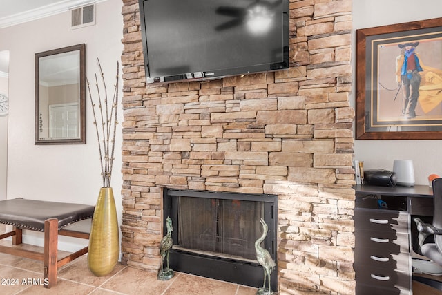 interior details with ornamental molding and a fireplace