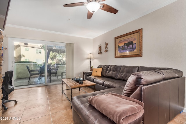 tiled living room featuring ceiling fan and ornamental molding