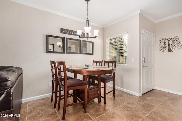 dining space with an inviting chandelier and ornamental molding