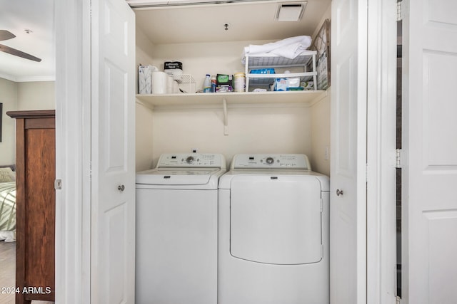 laundry area with separate washer and dryer, ceiling fan, and ornamental molding