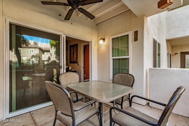 view of patio / terrace featuring ceiling fan