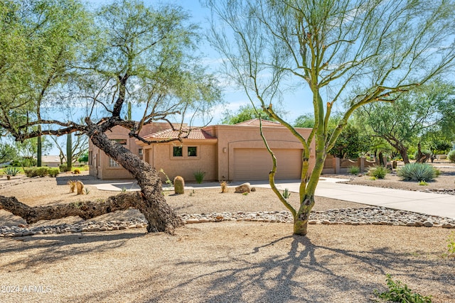 view of front of home with a garage