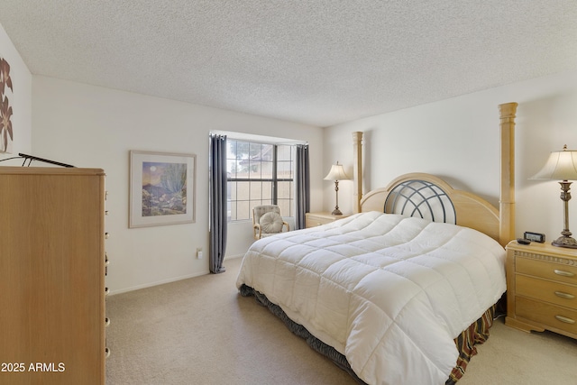 carpeted bedroom featuring a textured ceiling