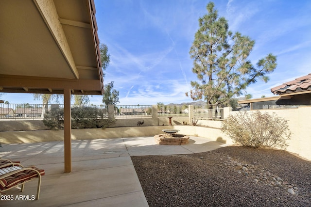 view of yard with a patio area and a fire pit