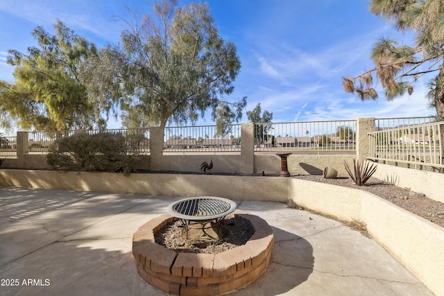 view of patio featuring a fire pit