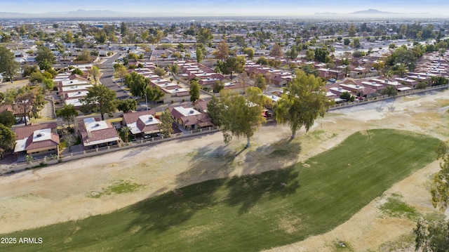 drone / aerial view featuring a mountain view