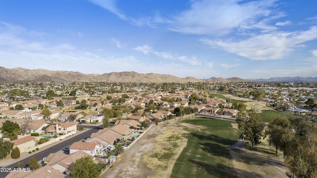 drone / aerial view featuring a mountain view