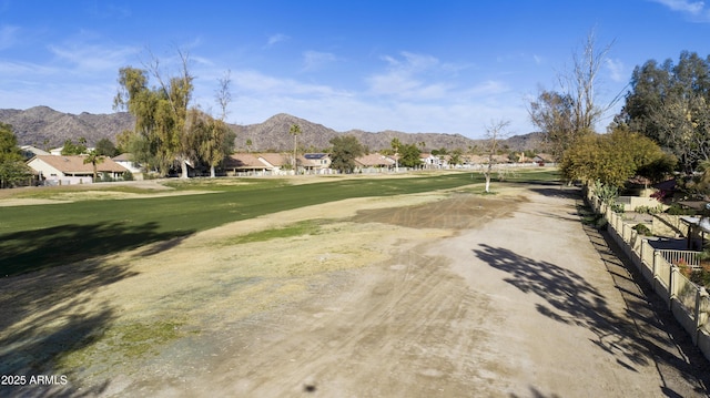 view of community featuring a yard and a mountain view