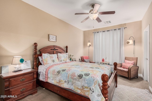 bedroom with ceiling fan and light colored carpet