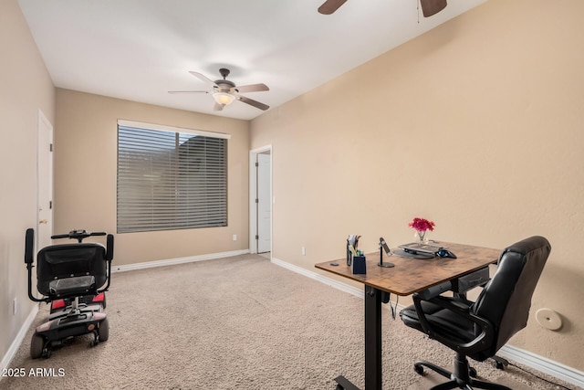 carpeted office with ceiling fan