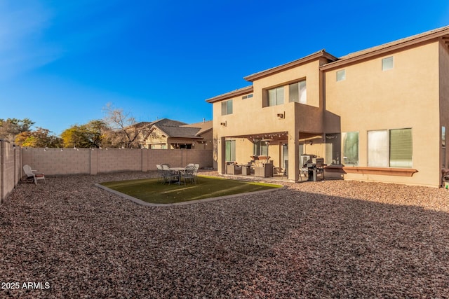 back of house with a patio area