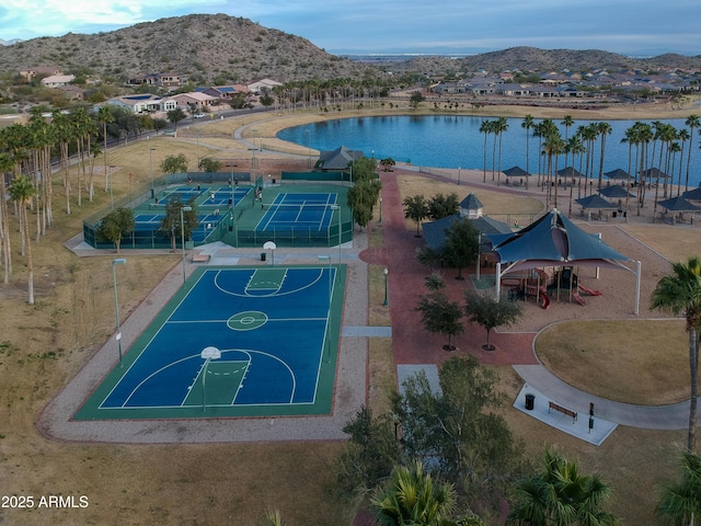 bird's eye view featuring a water and mountain view