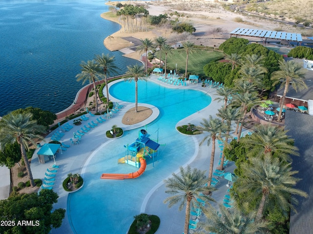 view of pool featuring a water view and a water slide