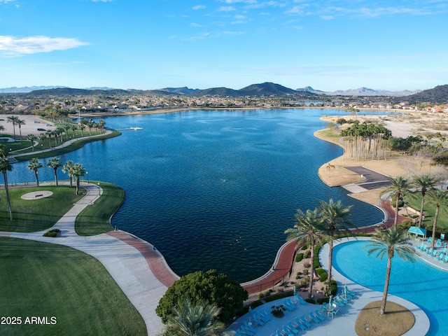 aerial view featuring a water and mountain view