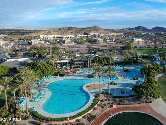 view of pool with a mountain view