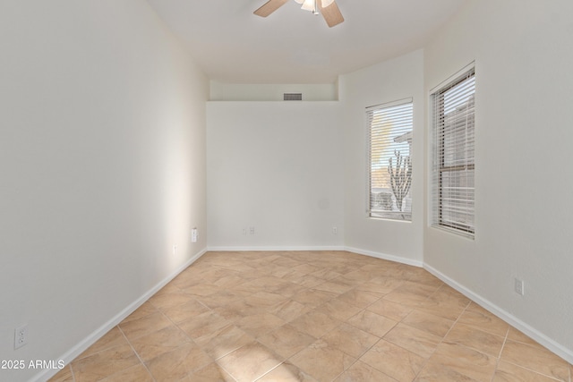 unfurnished room featuring ceiling fan