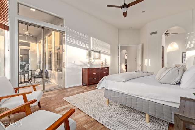 bedroom featuring ceiling fan and light hardwood / wood-style floors