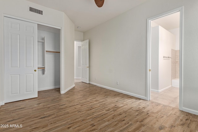 unfurnished bedroom featuring a closet, ceiling fan, and light hardwood / wood-style floors