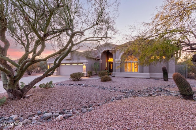 view of front of house with a garage