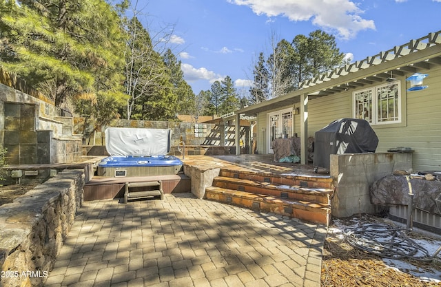 wooden deck featuring french doors, a patio, and grilling area