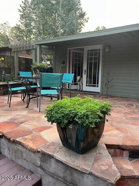 view of patio featuring a pergola