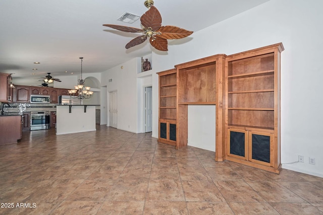 5226 W Pontiac Dr, Glendale, AZ 85308 - unfurnished living room with a sink, visible vents, vaulted ceiling, and ceiling fan with notable chandelier