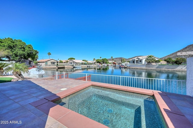 5226 W Pontiac Dr, Glendale, AZ 85308 - view of swimming pool featuring a patio, fence, a residential view, and a water view