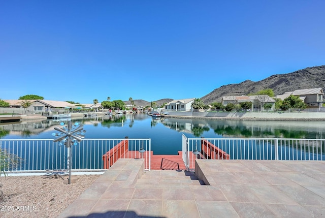 5226 W Pontiac Dr, Glendale, AZ 85308 - view of dock with a residential view, fence, and a water and mountain view