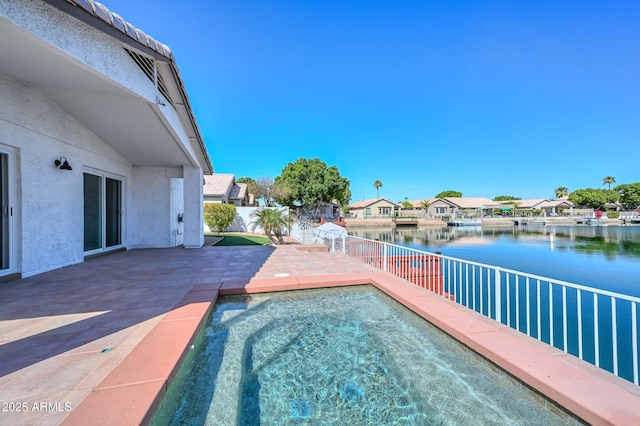 5226 W Pontiac Dr, Glendale, AZ 85308 - view of swimming pool with a hot tub, a water view, a patio, fence, and a residential view