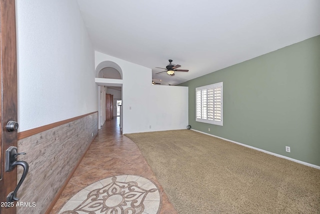 5226 W Pontiac Dr, Glendale, AZ 85308 - spare room with light carpet, a ceiling fan, and lofted ceiling