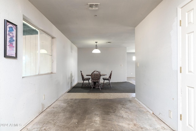 214 S Hing Dr, Superior, AZ 85173 - unfurnished dining area featuring concrete flooring