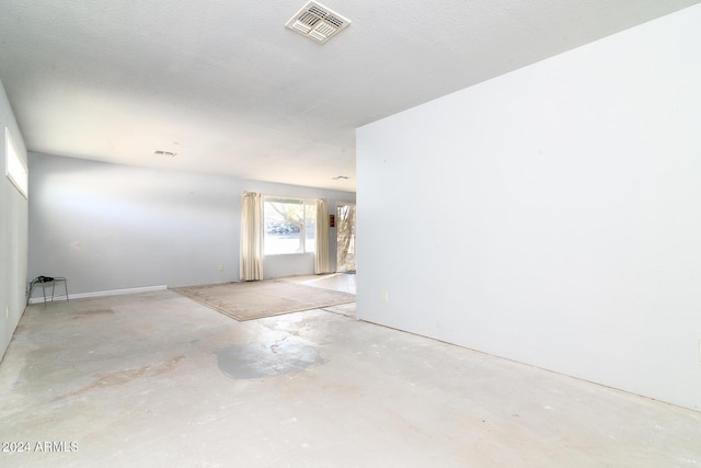 214 S Hing Dr, Superior, AZ 85173 - spare room with a textured ceiling