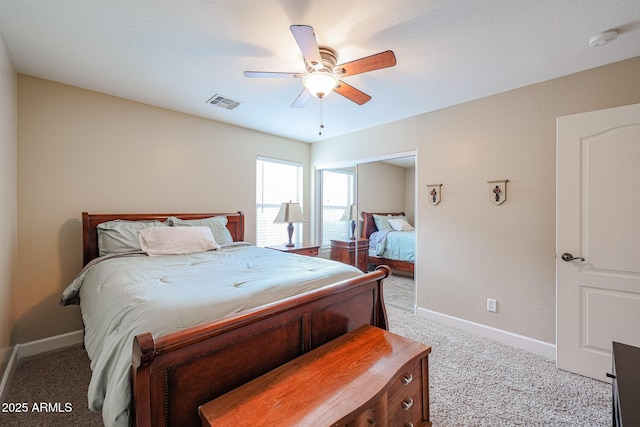 bedroom featuring light carpet and ceiling fan