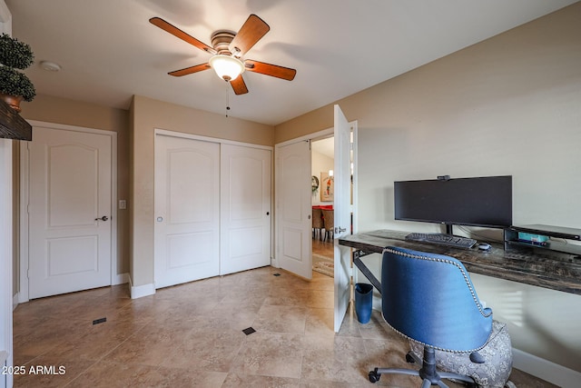 home office with ceiling fan