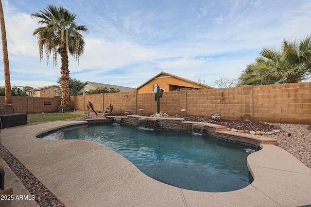 view of swimming pool with pool water feature