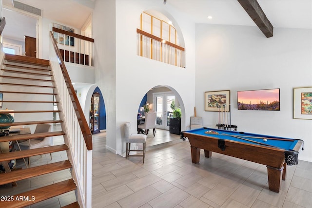 playroom featuring billiards, visible vents, arched walkways, french doors, and beamed ceiling