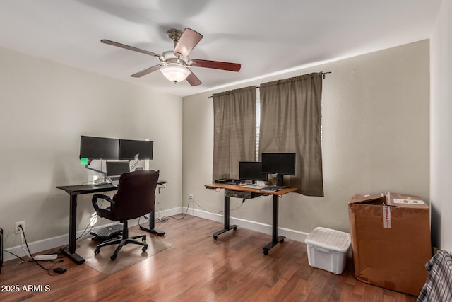 office area with ceiling fan and hardwood / wood-style floors