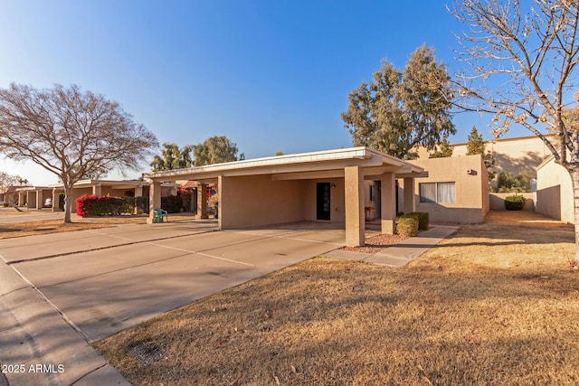 view of front of house featuring a carport