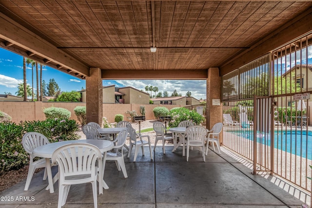 view of patio / terrace with outdoor dining space and a fenced backyard