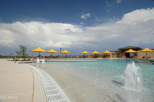 view of pool featuring pool water feature